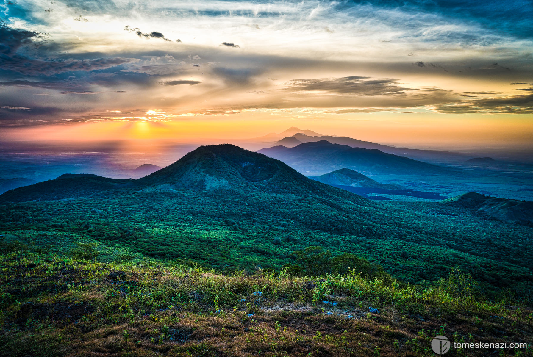 Alignment of the Ring of Fire volcanoes as seen from El Hoyo volcano at sunset, Nicaragua